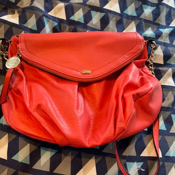 Juicy Couture Handbags - Juicy couture coral purse. Used but with lots of life left in good condition.